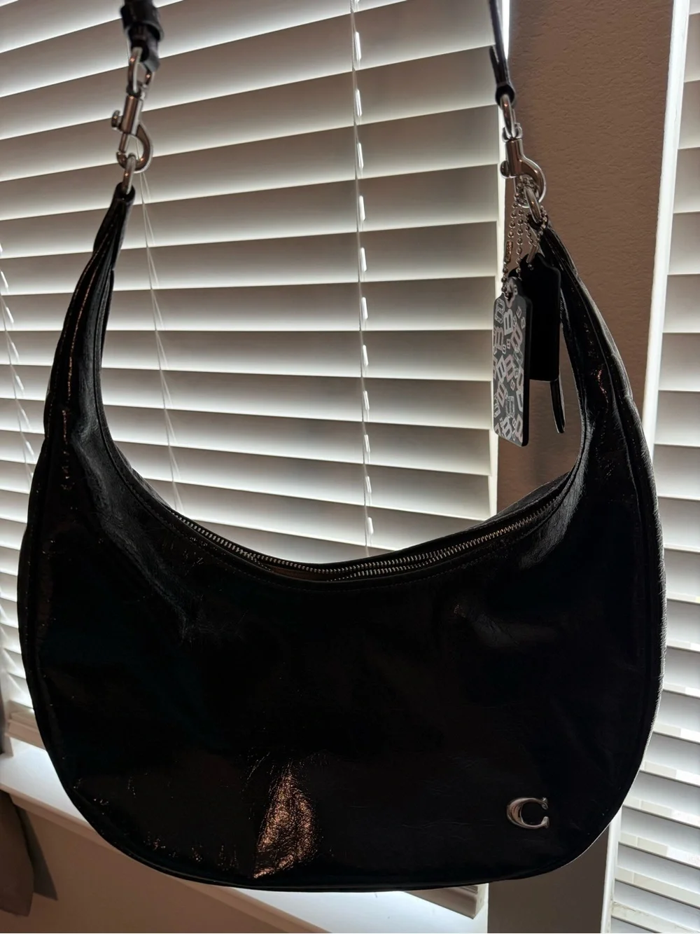Coach shiny black